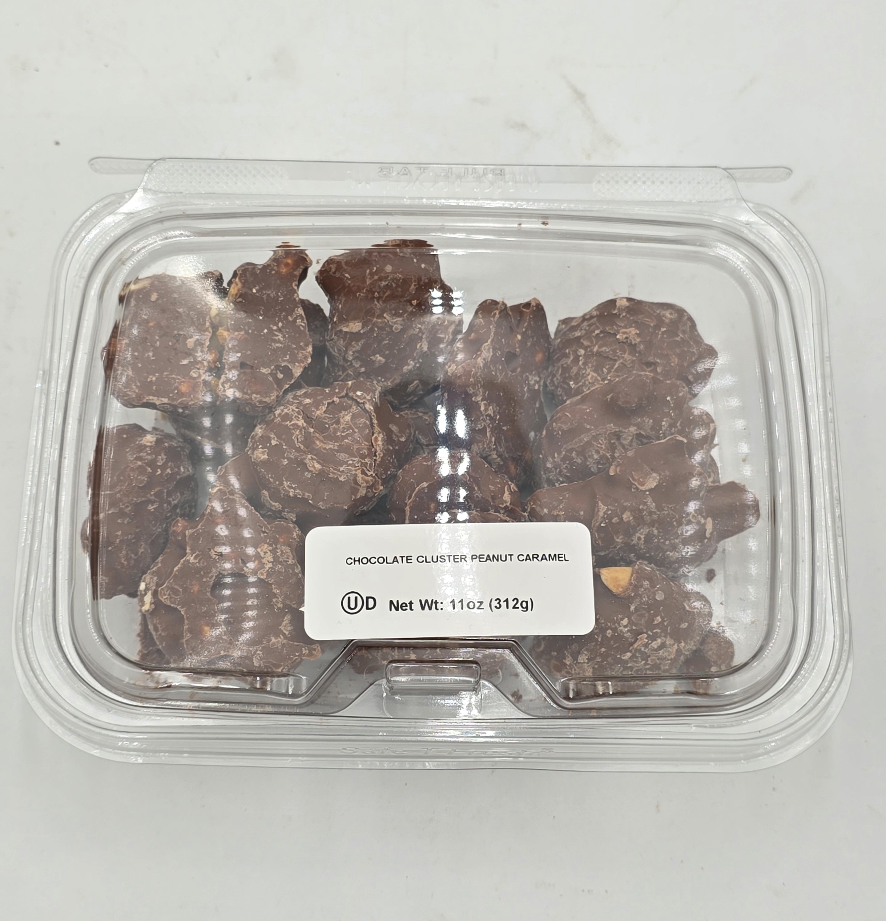 CHOCOLATE PEANUT CARAMEL CLUSTER